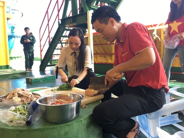 famous pho restaurant owner brings the dish to island soldiers for free picture 1