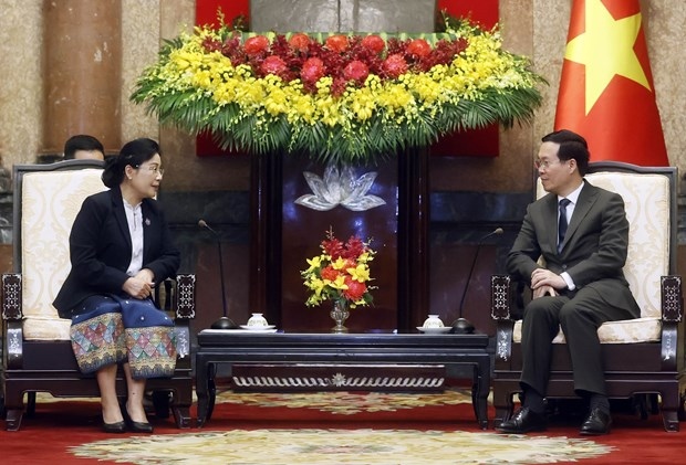 president vo van thuong welcomes chief justice of lao supreme court picture 1