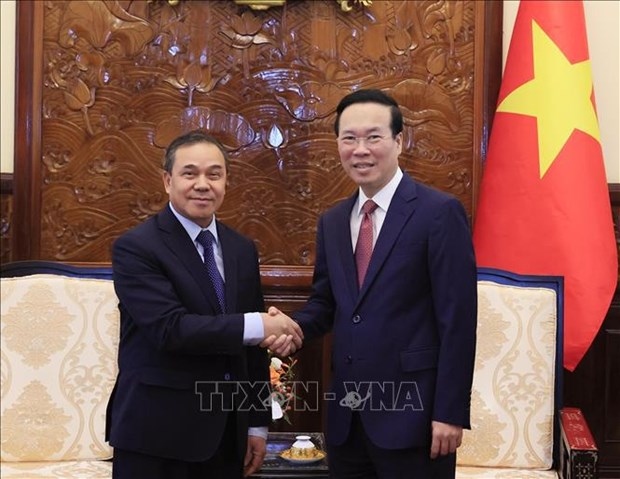 president hails lao support for vietnam s development picture 1
