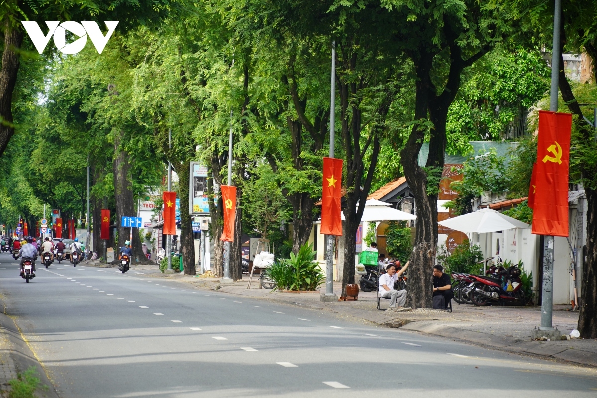 Red flags brighten up the streets of the southern city to mark the 78th anniversary of National Day.