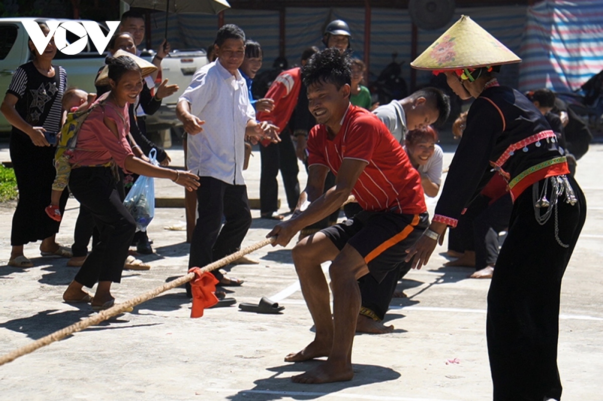 Locals enjoy playing tug of war during the festival.