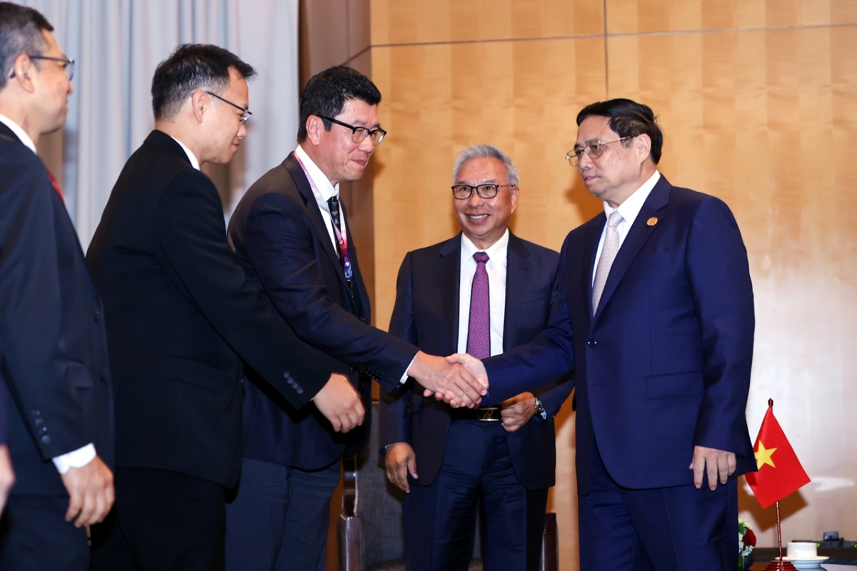 pm chinh receives leaders of major indonesian enterprises picture 1