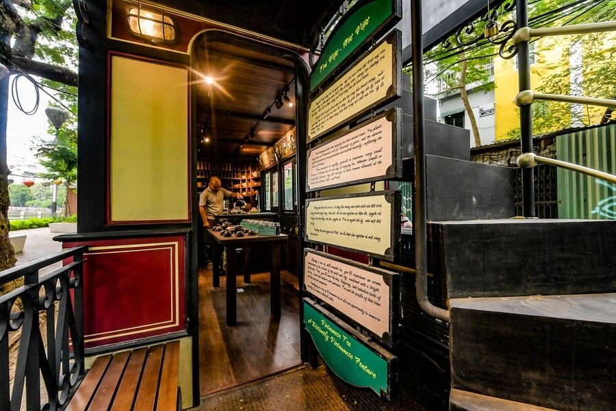 sipping tea inside old-style streetcar in vietnamese capital picture 12