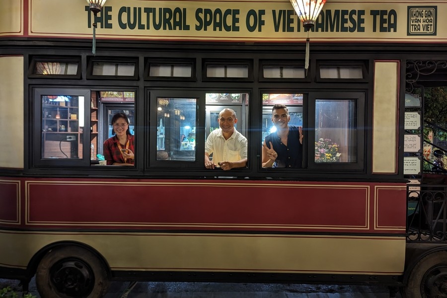 sipping tea inside old-style streetcar in vietnamese capital picture 15