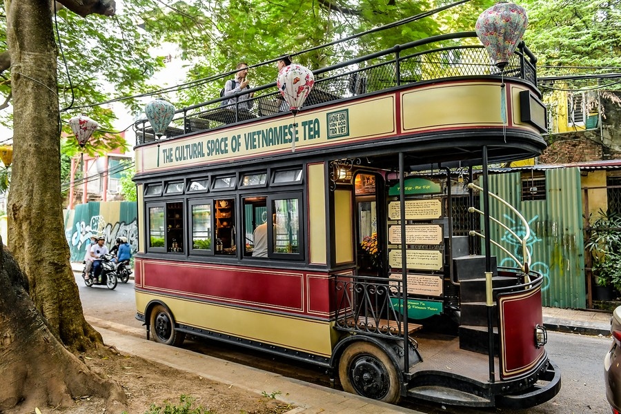 sipping tea inside old-style streetcar in vietnamese capital picture 3