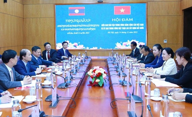 vietnam, laos to step up sharing mass mobilisation experience picture 1