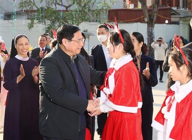 pm extends christmas greetings to catholics in bac giang picture 1