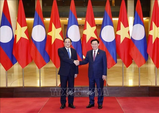 vietnam always gives top priority to special ties with laos na leader picture 1