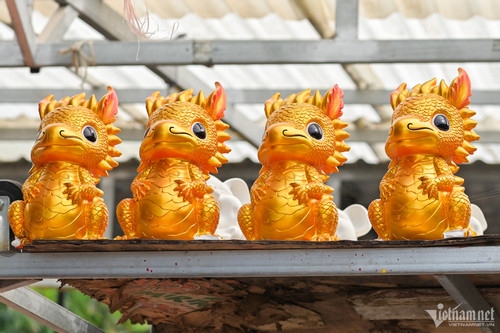 crafting clay dragon-shaped money savings boxes for tet celebration picture 5