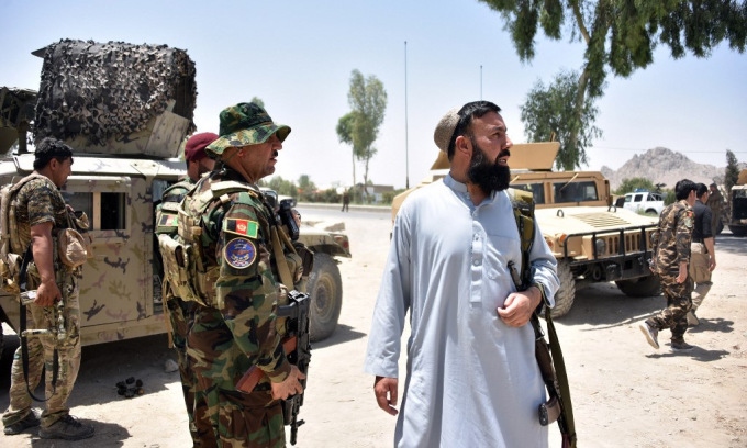 hoi nghi cap cao ve afghanistan khai mac, dai dien cua taliban vang bong hinh anh 1