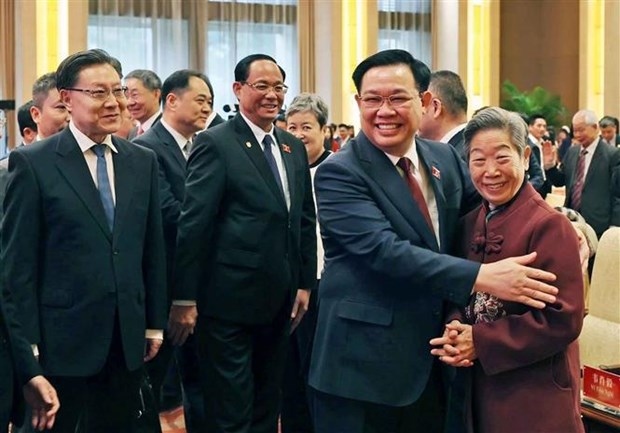 na chairman joins in vietnam - china people s friendship meeting picture 1