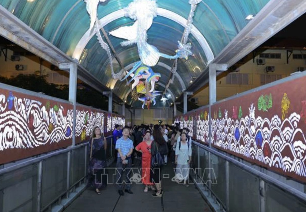 tran nhat duat pedestrian bridge with contemporary art installations opens picture 1