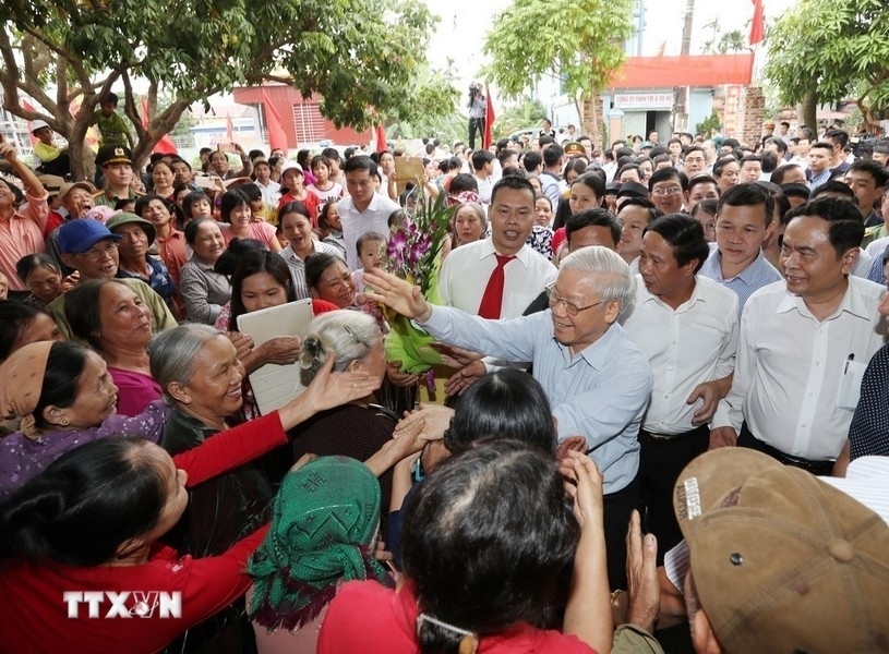 party leader nguyen phu trong and vietnamese people in photos picture 2