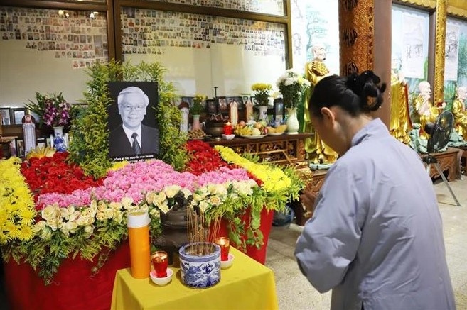 vietnamese community in laos mourns party general secretary nguyen phu trong picture 1
