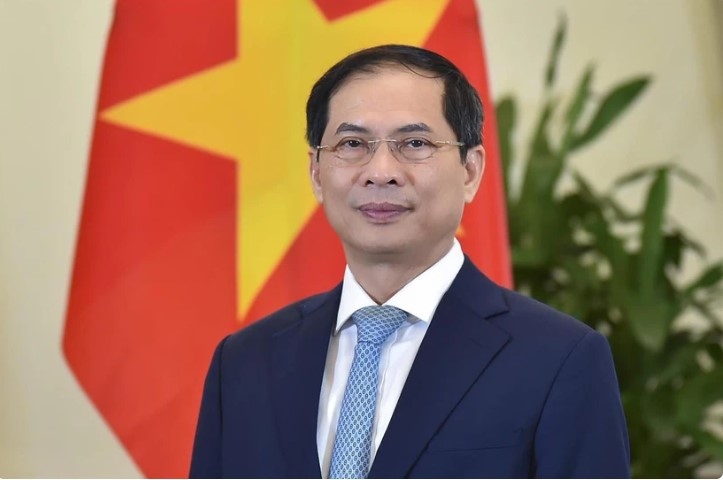 president s state visits contribute to strengthening vietnam-laos-cambodia cooperation fm picture 1