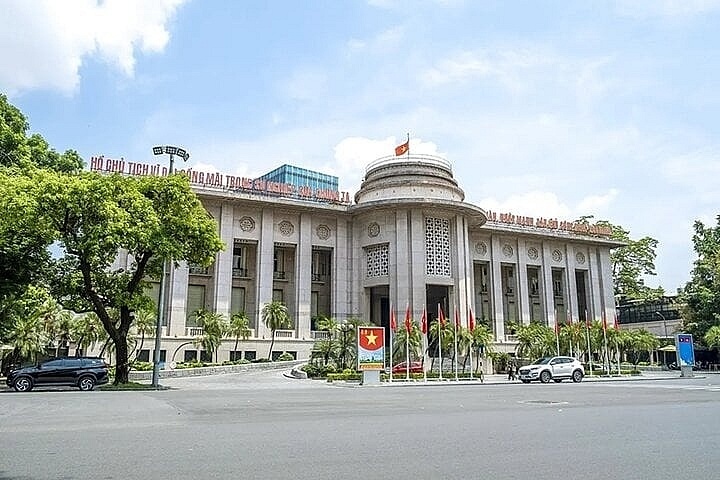 vnese, lao central banks discuss cooperation in using local currencies in trade picture 1