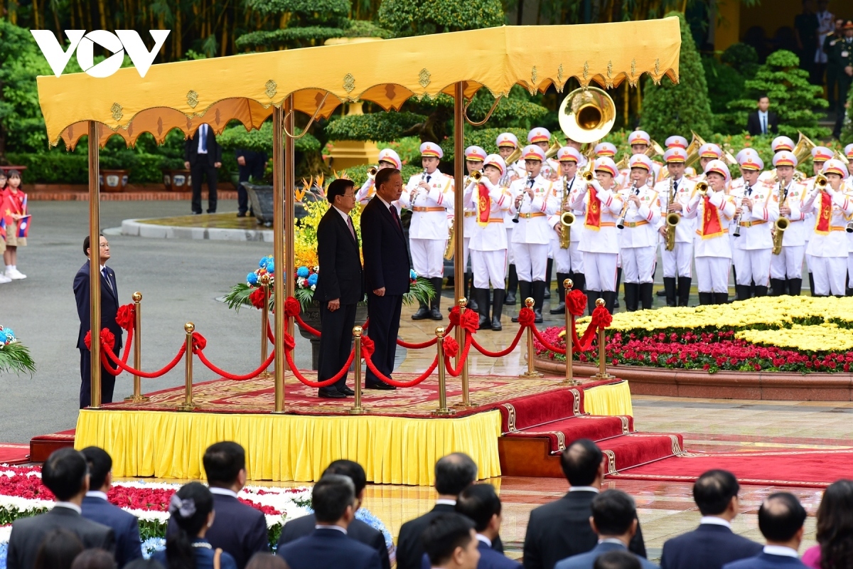 top lao leader thongloun sisoulith warmly welcomed in hanoi on official visit picture 3