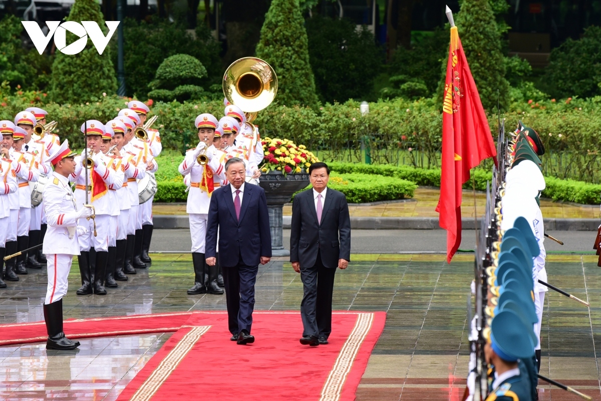 top lao leader thongloun sisoulith warmly welcomed in hanoi on official visit picture 4