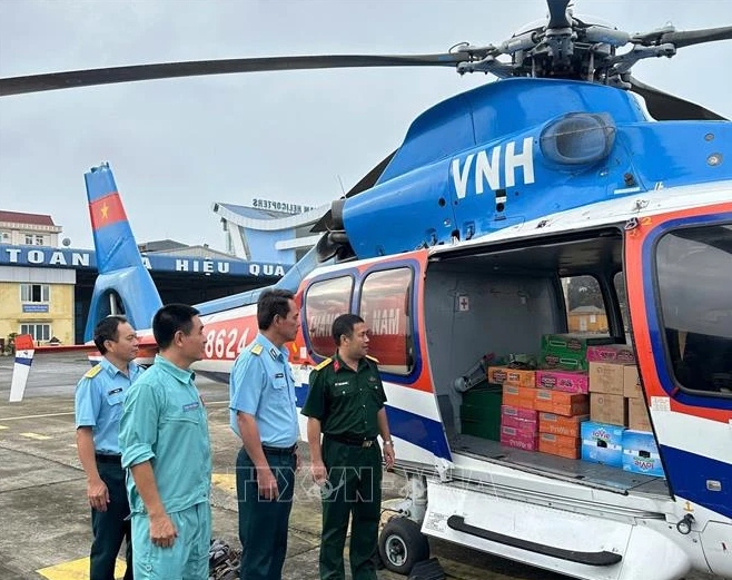 more helicopters take flight to transport relief packages for flood victims picture 1