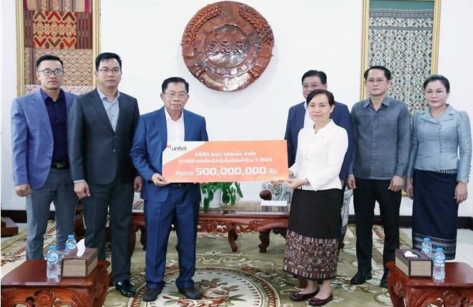 overseas vietnamese in laos support victims of typhoon yagi picture 1