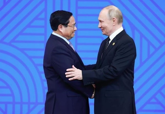 pm pham minh chinh attends russian president s welcome ceremony, reception picture 1