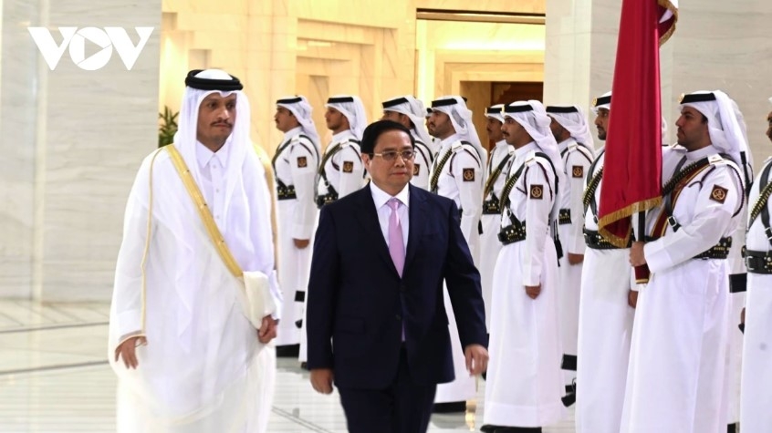 official welcome ceremony held for pm chinh in doha picture 2