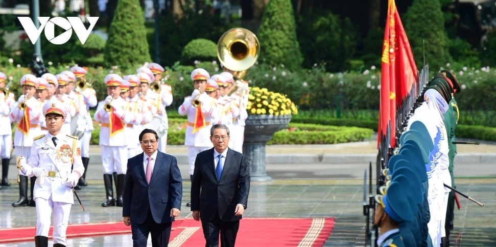 pm chinh hosts welcome ceremony for chinese premier picture 6