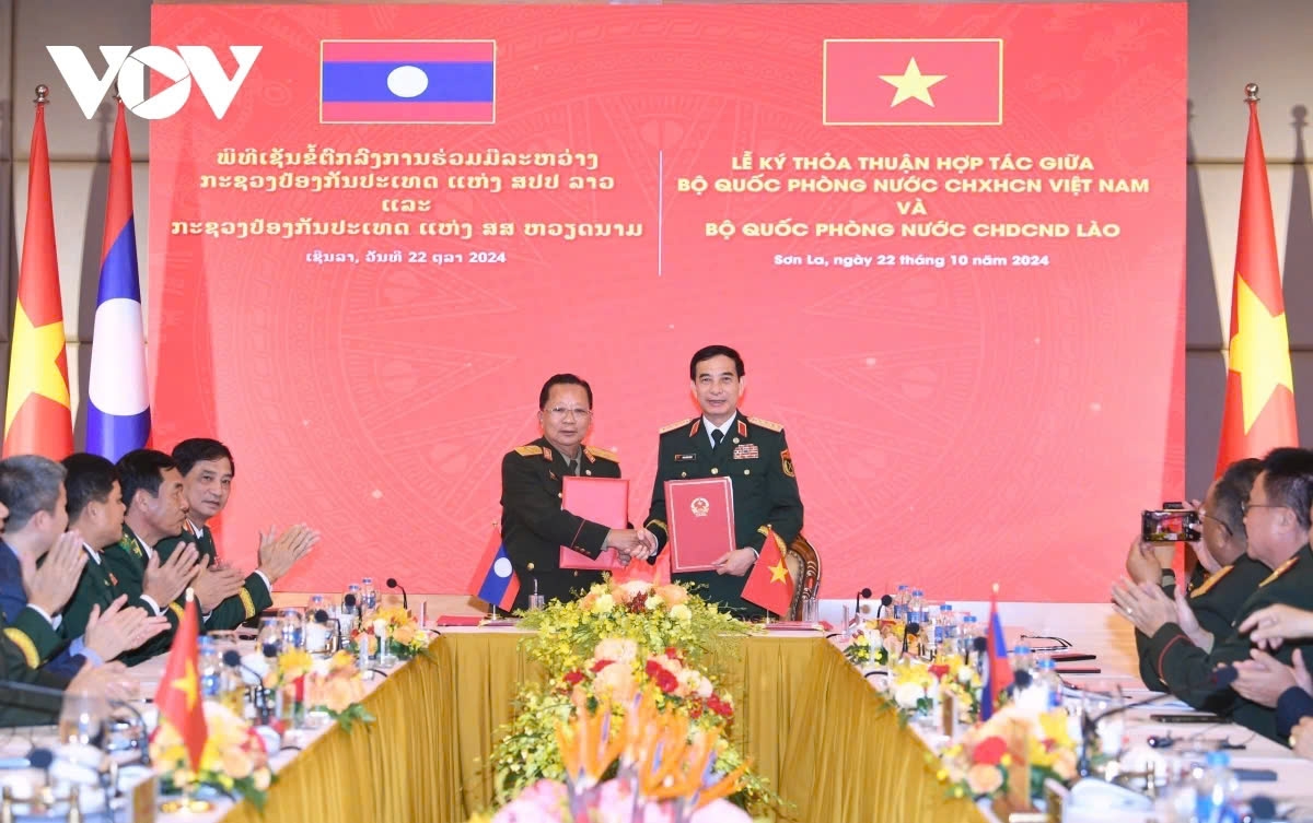 vietnam and laos sign bilateral defense cooperation document picture 1 vietnam and laos sign bilateral defense cooperation document picture 1