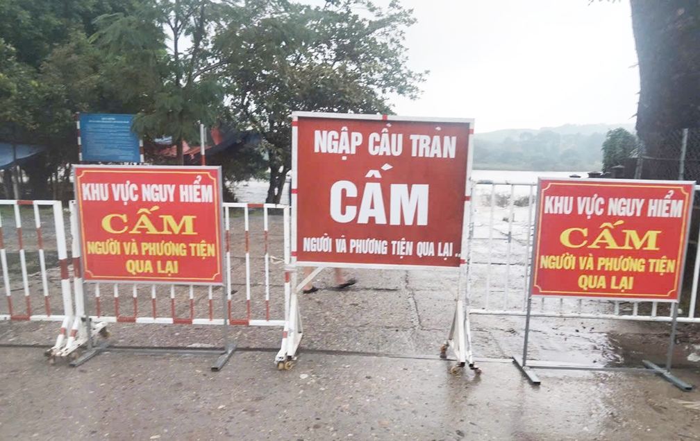 quảng ngãi cầu tràn thạch nham bị ngập, cấm người dân qua lại hình ảnh 1 quang ngai cau tran thach nham bi ngap, cam nguoi dan qua lai hinh anh 1