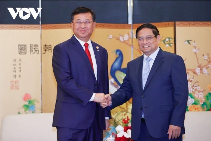 pm chinh meets with adb president and leaders of major chinese firms picture 2