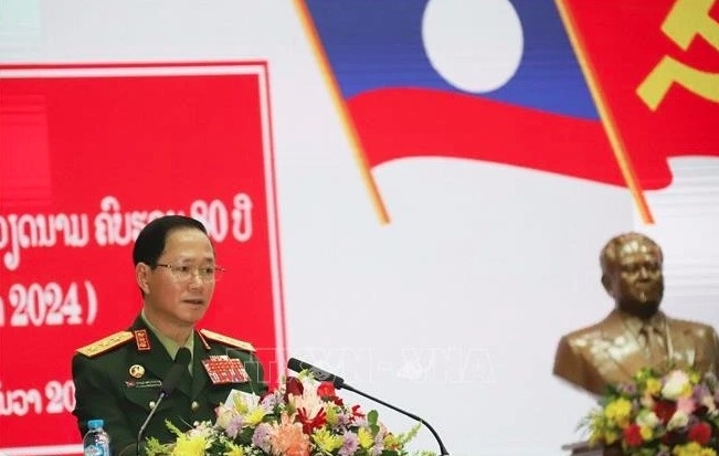 defence cooperation contributes to stability, prosperity of vietnam, laos picture 1