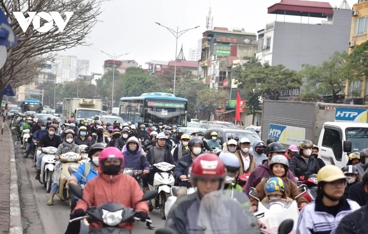 hanoi arteries go haywire as residents flock to hometown for tet holiday picture 12