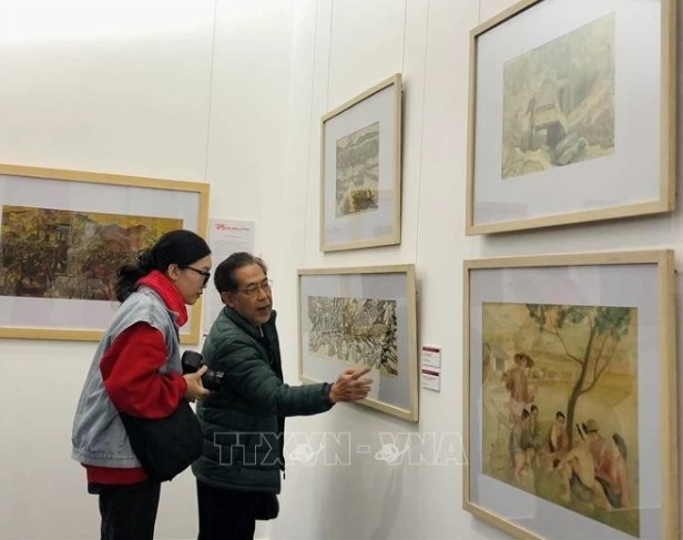 Exhibition celebrates Party’s founding, Lunar New Year