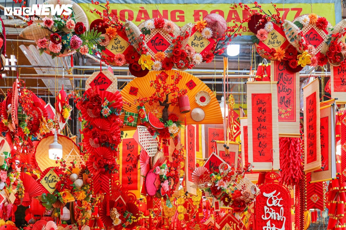 hang ma street decked out in red for tet celebrations picture 7