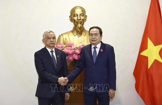 top vietnamese legislator hosts vice president of lao national assembly picture 1