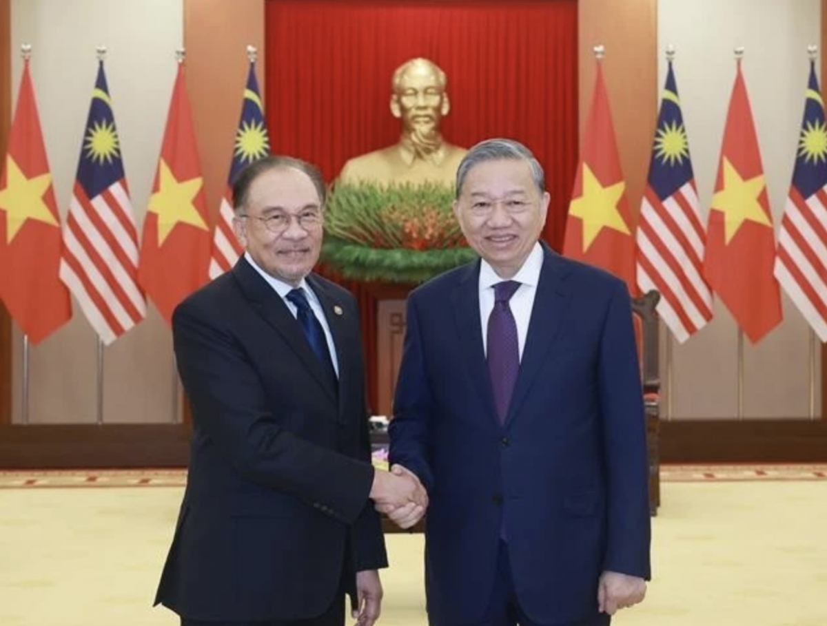 vietnamese party chief welcomes malaysian pm picture 1