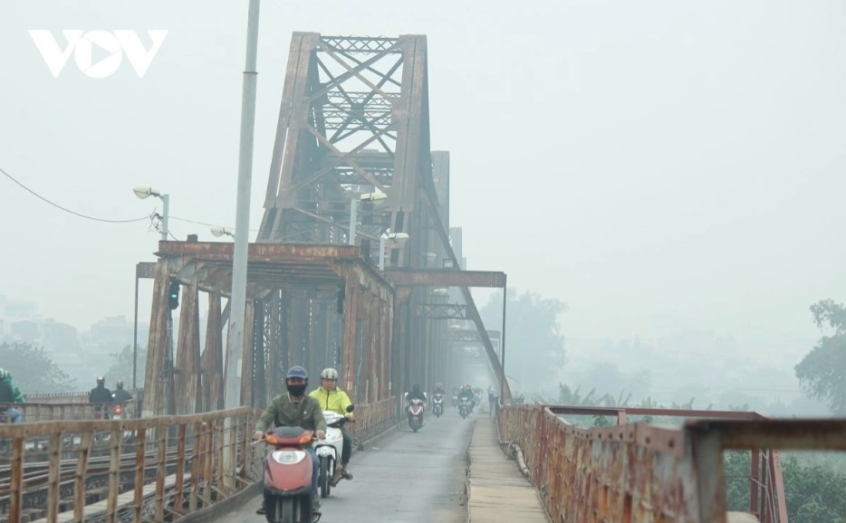 hanoi engulfed in spell of drizzle and fog picture 7