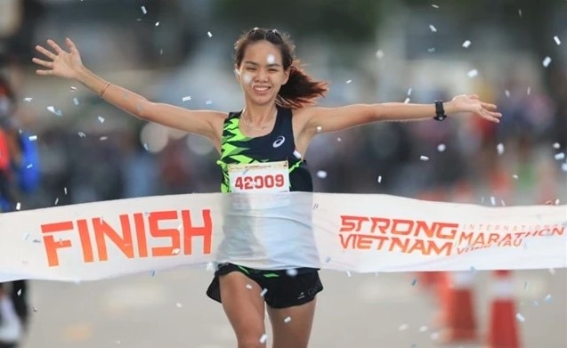 vietnamese champion hoa to run in tokyo marathon 2025 picture 1