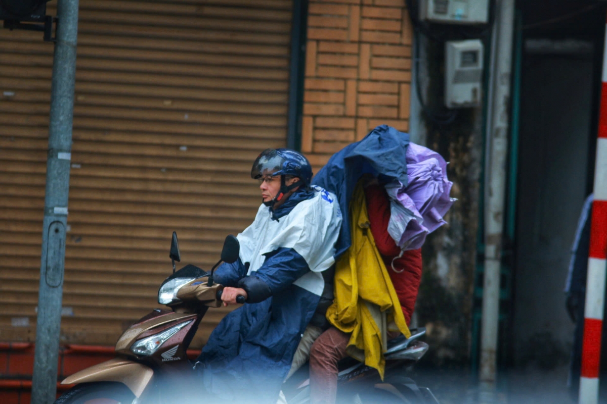 thoi tiet ngay 16 2 ha noi co mua nho rai rac, troi ret dam hinh anh 1