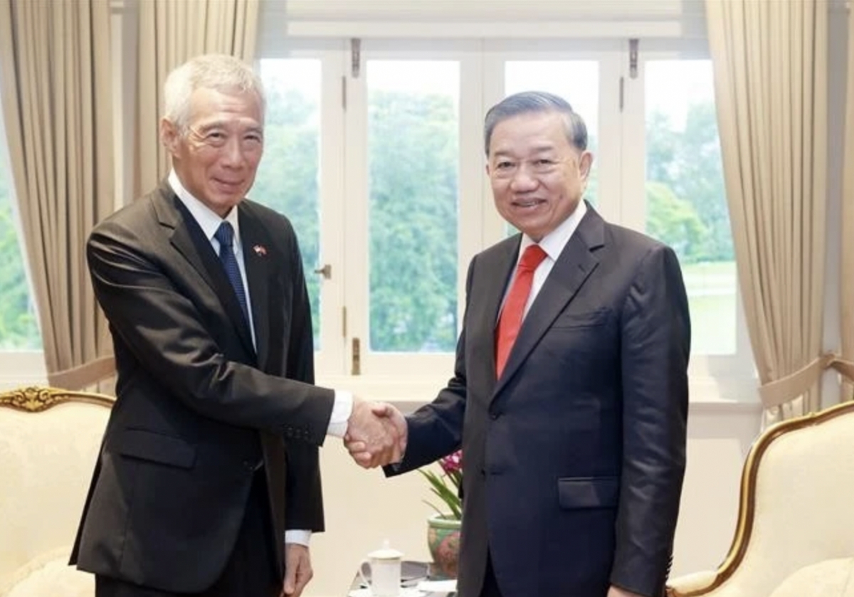 party leader meets former singaporean prime minister picture 1