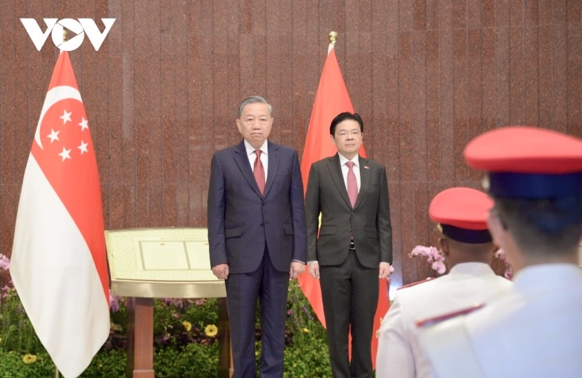 welcome ceremony for party general secretary to lam in singapore picture 1