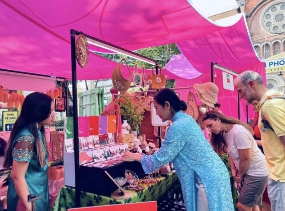 art programme honouring ao dai opens at hcm city book street picture 1