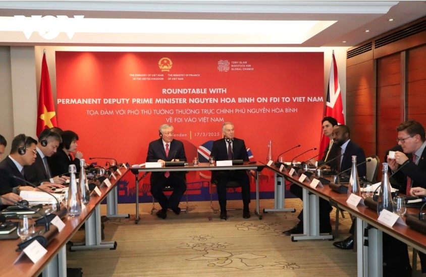 vietnam commits to further improving investment climate deputy pm picture 1