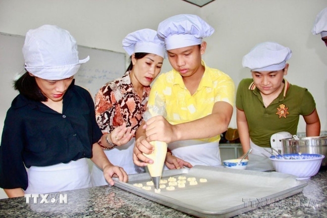 viet nam luon tao thuan loi cho nguoi khuyet tat thuc hien binh dang cac quyen hinh anh 2