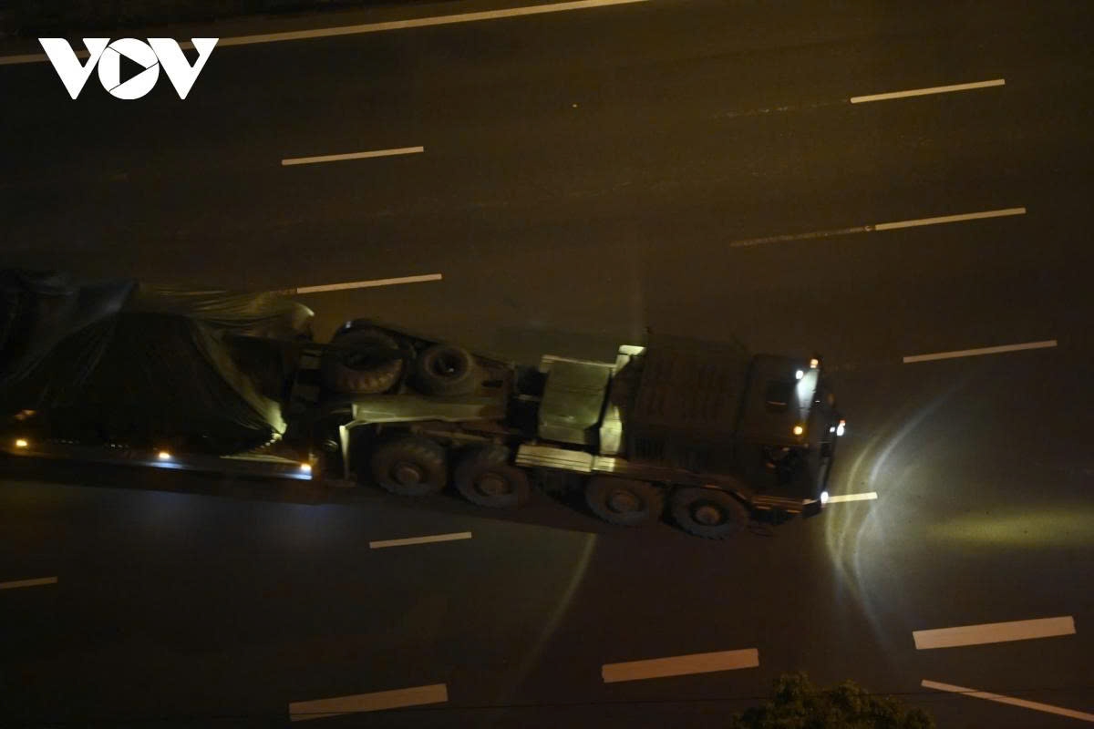 convoy of military hardware moves into hanoi city centre at night for military parade picture 11