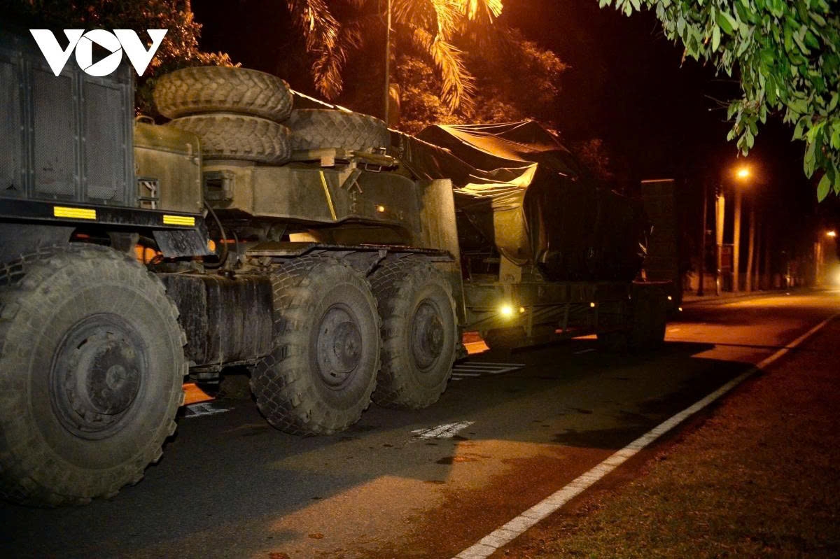 convoy of military hardware moves into hanoi city centre at night for military parade picture 3