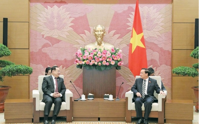 vietnamese and lao nas jointly compile first book marking 50 years of ties picture 1