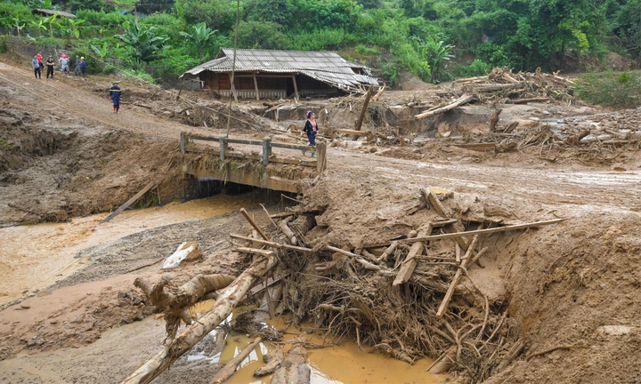tong bi thu Dam bao nguoi dan mat nha cua do mua lu co cho o, khong doi ret hinh anh 1