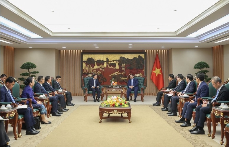 vietnam, laos boost strategic cooperation through soe reform experience picture 2