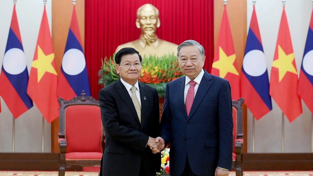 vietnam, laos leaders pledge stronger cooperation during hanoi meeting picture 1 vietnam, laos leaders pledge stronger cooperation during hanoi meeting picture 1